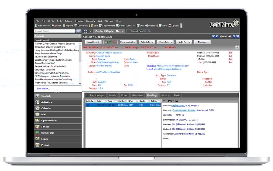 GoldMine CRM screenshot on a laptop