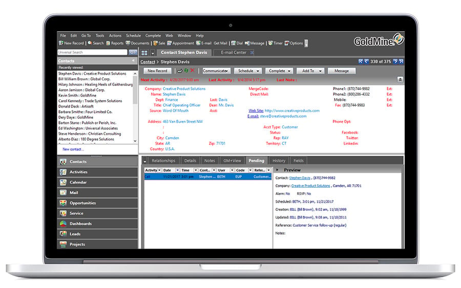 GoldMine CRM screenshot on a laptop